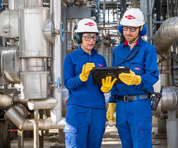 Two workers at factory